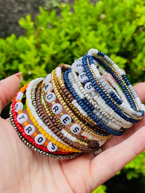 Custom beaded memory wire wrap bracelet with team name/choice of word(s)