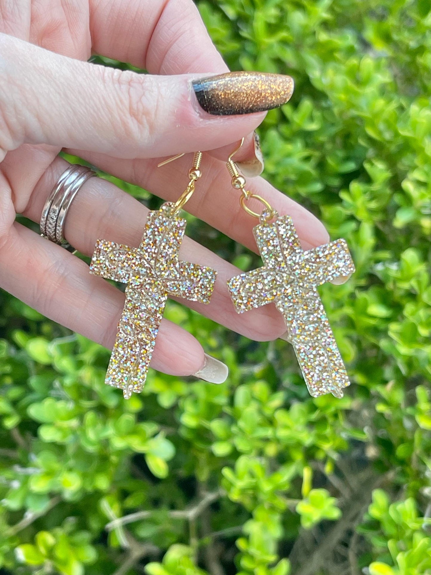 Sparkly cross earring engraved with “Jesus” - Ornate Cross glitter resin earrings