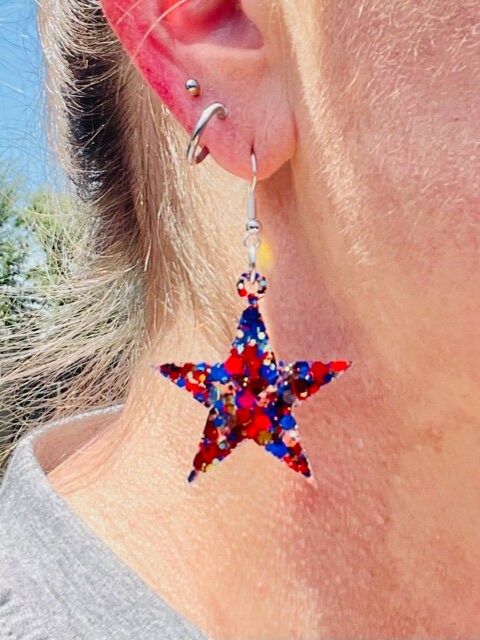 Star dangle glitter resin earrings