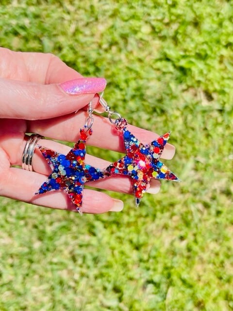 Star dangle glitter resin earrings