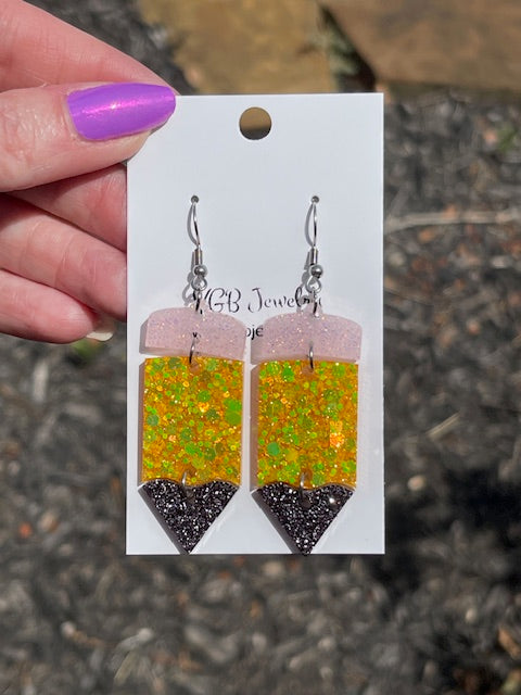Dangling pencil glitter resin earrings